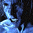 Pixelated blue-toned image of a person with closed eyes and raised hand, overlaid by 'UNDERWORLD' text in two