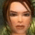 A pixelated close-up of a person's face with brown hair, neutral expression, and greenish background.