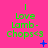 Bright pink background with green text reading "Love Lamb-Chops<3" and small blue pixelated symbols changing across three