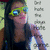 A person with long dark hair and yellow sunglasses appears in a of four , with text reading "Get Inside the..." visible on the right side of the