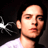 Static pixelated image of a person's face and upper torso with dark background, white shirt, and visible facial features including eyes, nose, mouth, ear, and hair.