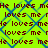 Bright yellow background with blue diamond pattern overlaid by repeating red text 'He loves me' and 'loves me'