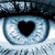 A four- shows a blue eye with a heart-shaped pupil, five colored hearts, a person in a cap, and a blank gray