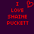 Red pixelated text on dark purple background reads 'I LOVE SHAIN PUCKETT' with a heart symbol replacing the 'O' in LOVE.