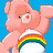 A Care Bear character with a rainbow belly badge appears in the top-left frame of a 2x2 contact sheet, accompanied by text fragments "When in doubt," and "SMILE!" on blue backgrounds with gray transparency areas.