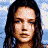 A 2x2 contact sheet of four pixelated frames showing a woman with long dark hair in different poses and backgrounds, with "Coolbuddy.com" text on the right frame.