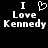 Black background with white pixelated text reading "I Love Kennedy" and a heart symbol replacing the 'L' in Love on the left side.