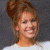 A pixelated image of a person with brown hair in an updo wearing a white top against a gray background, next to green text reading 'Original Icons .com' on dark green.