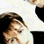 nine pixelated images showing various facial features and a person in a blue jacket against white and colored backgrounds