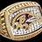 Pixelated circular icon with beige and brown tones, featuring a stylized figure in purple and red on a white background.