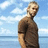Pixelated image of a person in brown shirt standing against blue sky and water, with orange text 'RIP Charlie' on black background.