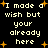 Pixelated text on black background with orange stars, repeating 'I made a wish but your already here' in multiple