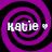 Four identical display a purple and black spiral background with the text 'katie' and a small heart symbol in white pixelated font