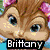 Pixelated cartoon character with brown hair and pink bow, smiling face, blue eyes; static image.