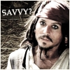 A static image of a person with long brown hair and a bandana, wearing a white shirt, with 'SAVY?' text in the top-left corner.
