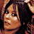 Pixelated animated contact sheet showing a woman in a brown bikini top with white trim across eight frames, featuring visible text "Coolbuddy.com" on a black background at the bottom center.