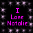 Black background with repeating light purple star-like patterns and four identical pink text blocks reading "I Love Natalie" arranged in a