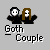 Pixelated image of two figures in black clothing with white faces, one with short dark hair and the other with long brown hair, standing side-by-side against a gray background.