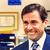 A pixelated image shows a person in formal attire with a framed certificate and blue object behind them, next to text reading "That's what she said!!" on a red background.