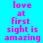 A static image displays pink pixelated text on a bright cyan background, reading 'love at first sight is amazing' in two identical vertical