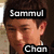 A pixelated image of a person with short dark hair, wearing a white shirt and dark jacket, showing two states: one with text overlays 'Sammul' above the head and 'Chan' below the chin, and another without text.