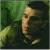 A 50x50 pixel animated buddy icon featuring a side-profile of a person with dark hair against green foliage on the left, and bright green text reading "Original Icons .com" on a solid green background on the right.