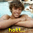 Pixelated image of a person with brown hair resting arms on a surface, light blue background, yellow text at bottom reads 'hott...'