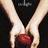 Two hands hold a red sphere above a white chess queen on black background with text "breaking dawn" below.