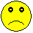 Two yellow pixelated smiley faces with black outlines, one without a tear and the other with a single blue teardrop on its left cheek.