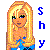Pixelated cartoon-style icon of a blonde woman with long hair wearing blue clothing, next to vertical blue text "shy" on white background.