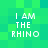 Green pixelated background with four identical text blocks reading "I AM THE RHINO" in white block letters.