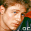 Two side-by-side pixelated frames of a person's face with visible text "OC" at the bottom, part of an animated contact sheet.