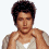 Two side-by-side pixelated images of a person with dark hair wearing light-colored clothing against white backgrounds.