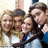 A red background displays four people in a group photo with text overlays reading 'You Know You', 'Love Me', and 'XOXO Gossip Girl' in pixelated font.