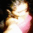 Two identical pixelated figures with light brown hair and pink clothing, one displaying a purple '<3' symbol above the head.