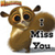 Pixelated brown cartoon lemur holding a sign that reads "I Miss You" with orange and red gradient accents above its head.
