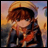 A pixelated anime-style character with brown hair and a yellow cap stands against a sunset background, next to stylized text reading "Anime IM" and "com" on a black backdrop.