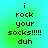 Pixelated text on a gradient background with four identical showing 'i rock your socks!!!!! duh' in black font