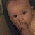 A baby's face appears in four quadrants with varying expressions and cropping, showing a hand near the mouth in some views.