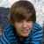 A person in a blue striped shirt appears in three with changing facial expressions and text overlay