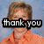 A person in an orange collared shirt with light brown hair against a blue background, overlaid with black text reading 'thank you' in white letters.