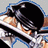 Pixelated anime-style character with dark hair and white clothing, partially visible against a black background with white text.