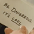 Pixelated image showing partial text fragments and a hand with fingers visible against a light background.