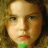 A 48x48 pixel buddy icon featuring a split composition with a child's face on the left and "KILL BILL VOL.1" text on the right, rendered in low-resolution pixel art style.