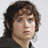 Pixelated image of a person with brown hair and light eyes on left, black background with white text "I love da HOT Hobbit" on right.