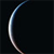 A curved, pixelated arc of light transitions from dark blue to white against a solid black background, with no visible text or additional elements.