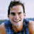 A split-frame contact sheet showing a pixelated image of a person on the left and green text logo on dark background on the right, both in low-resolution 48x48 pixels per frame.
