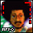Pixelated image of a person with orange-brown skin tone wearing white and green clothing, framed by red L-shaped borders on top-right and left edges.