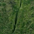 A static pixelated image with a vertical dark line on a greenish background, showing no distinct subjects or objects.