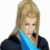 A pixelated image shows a person with blonde hair wearing a dark top and blue scarf, next to text reading 'the ehill y academie' on black background.